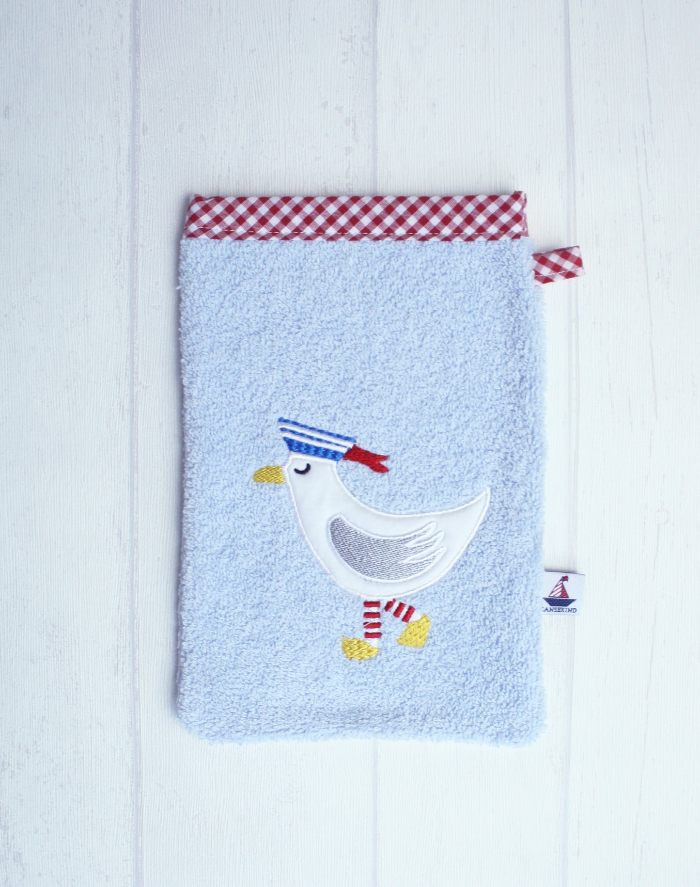 Waschhandschuh-blau-mit-Moewe1rpLNumVT0dtEL